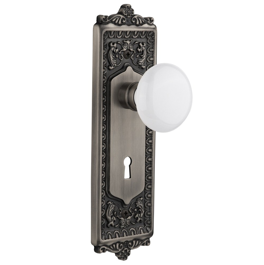 Privacy Egg & Dart Plate with Keyhole and White Porcelain Door Knob in Antique Pewter