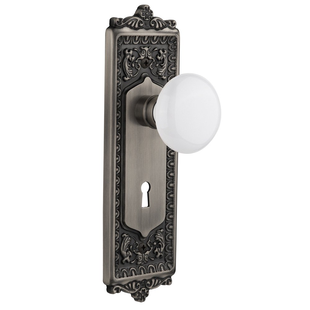 Double Dummy Egg & Dart Plate with Keyhole and White Porcelain Door Knob in Antique Pewter