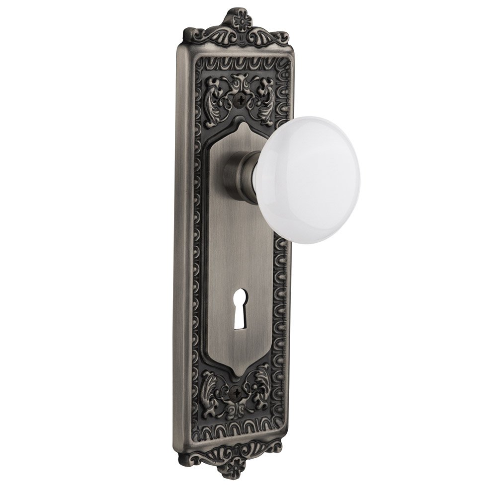 Single Dummy Egg & Dart Plate with Keyhole and White Porcelain Door Knob in Antique Pewter