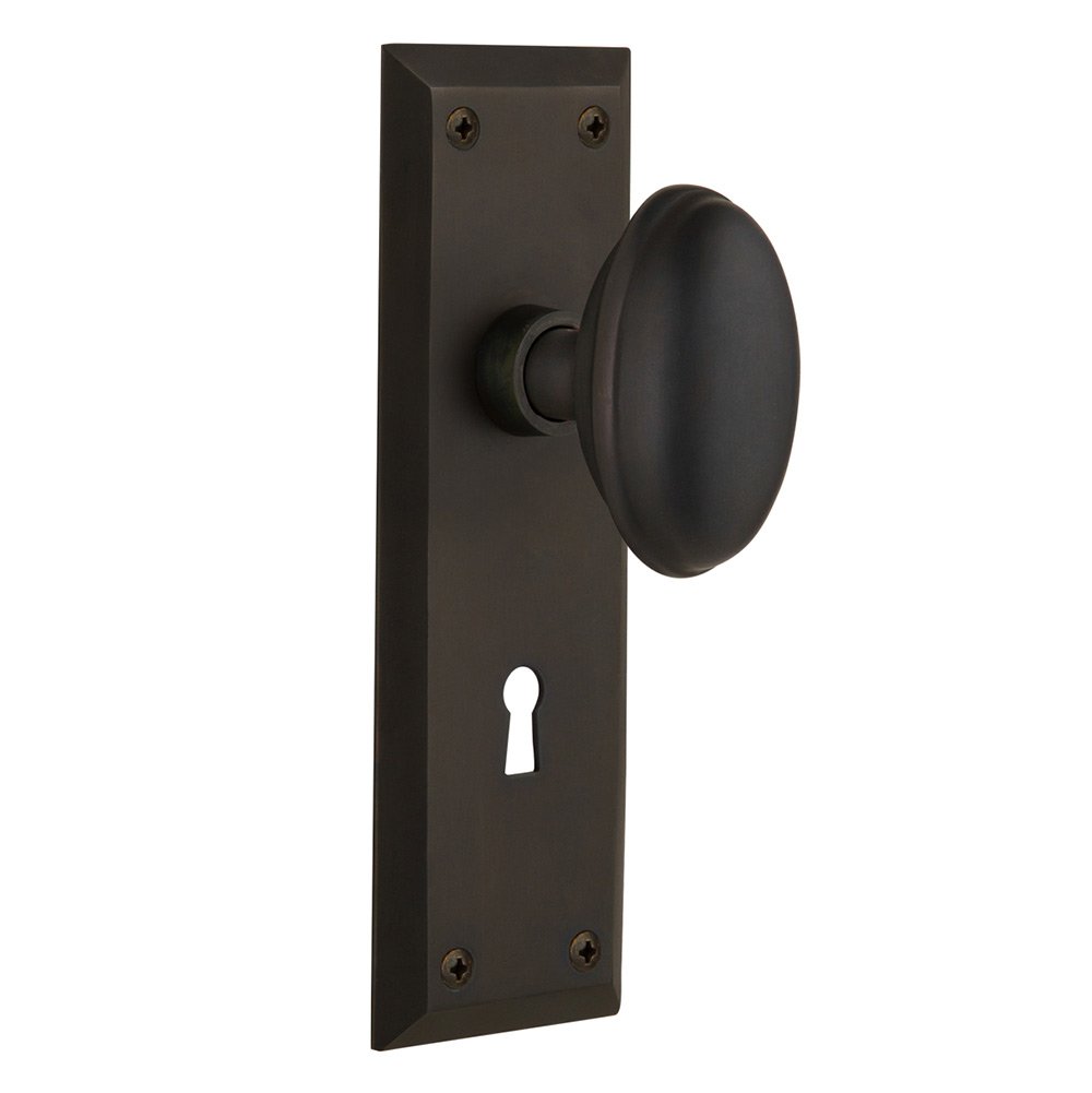 Privacy New York Plate with Keyhole and Homestead Door Knob in Oil-Rubbed Bronze