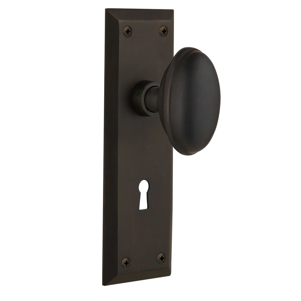 Single Dummy New York Plate with Keyhole and Homestead Door Knob in Oil-Rubbed Bronze