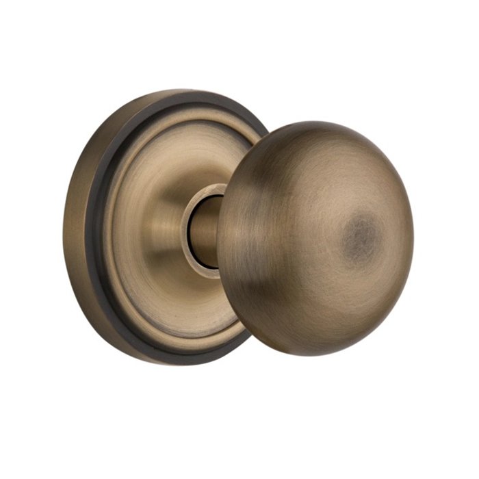 Double Dummy Classic Rosette with New York Door Knob in Antique Brass