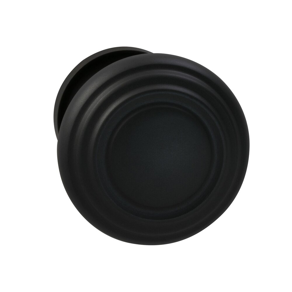 Single Dummy Traditions Contoured Door Knob with Small Radial Rosette in Oil Rubbed Bronze Lacquered