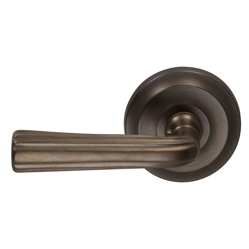 Passage Traditions Left Handed Lever with Radial Rosette in Antique Bronze Unlacquered