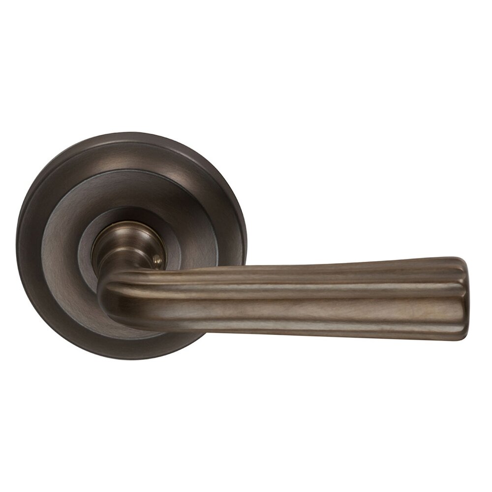 Passage Traditions Contoured Lever with Small Radial Rosette in Antique Bronze Unlacquered