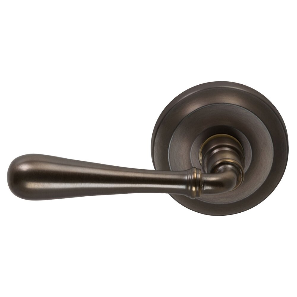 Passage Traditions Left Handed Lever with Radial Rosette in Antique Bronze Unlacquered