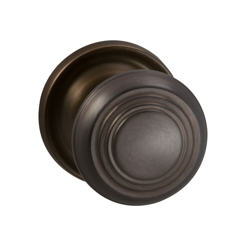 Single Dummy Traditions Timeless Door Knob with Medium Radial Rosette in Antique Bronze Unlacquered