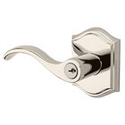 Left Handed Keyed Curve Door Lever with Traditional Arch Rose in Polished Nickel