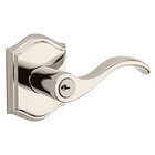 Right Handed Keyed Curve Door Lever with Traditional Arch Rose in Polished Nickel